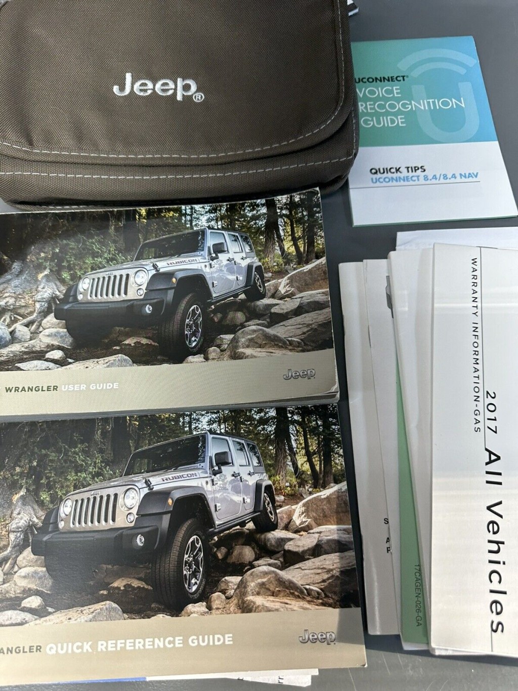 Picture of: Jeep Wrangler OWNERS GUIDE MANUAL with CASE Books OEM Factory USED